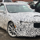 Illustration for article titled Why Is There a Fake Dodge Charger Taillight on This Cadillac CT5 Prototype?